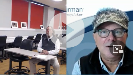 Split screen video conference featuring two men, one in a meeting room and one in a close-up with 'Furman Attorneys at Law' branding.