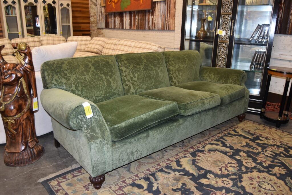 Green patterned velvet vintage damask sofa with rolled arms, offering unique secondhand furniture and affordable home decor from Baltimore non-profit Second Chance.